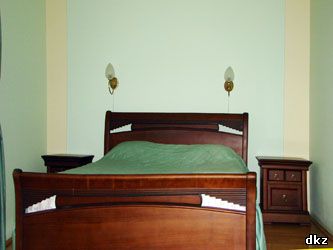 Интерьер спальни номера люкс повышеного комфорта